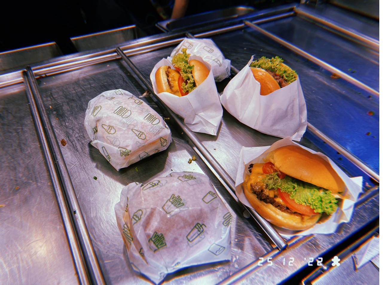 Shake Shack burgers on display in the window
