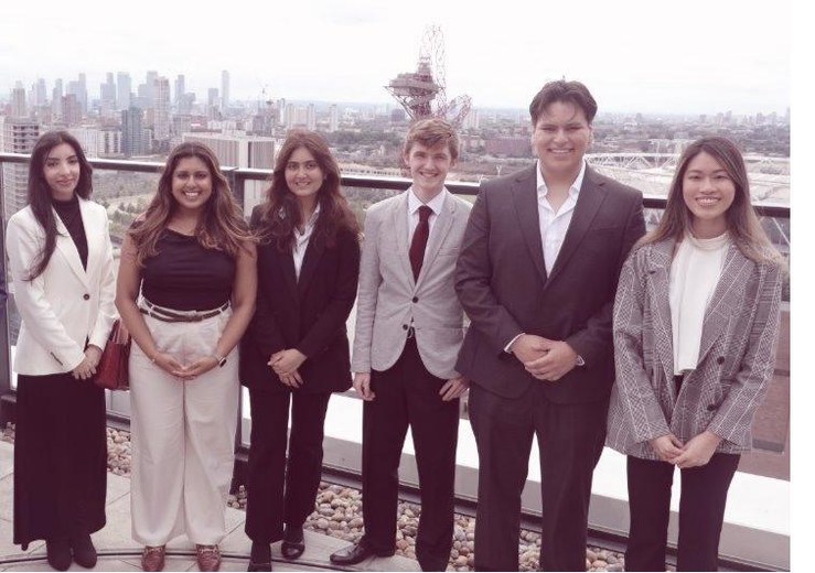 Group photo at the FCA building rooftop with fellow delegates